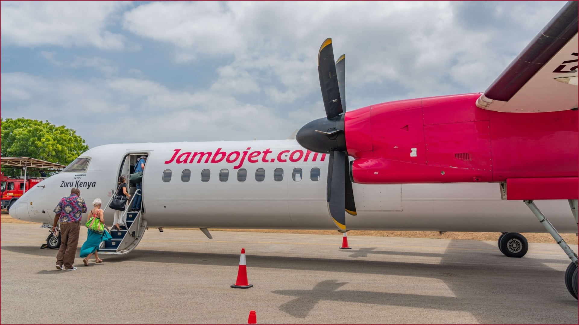 Travellers boarding a Jambojet plane.